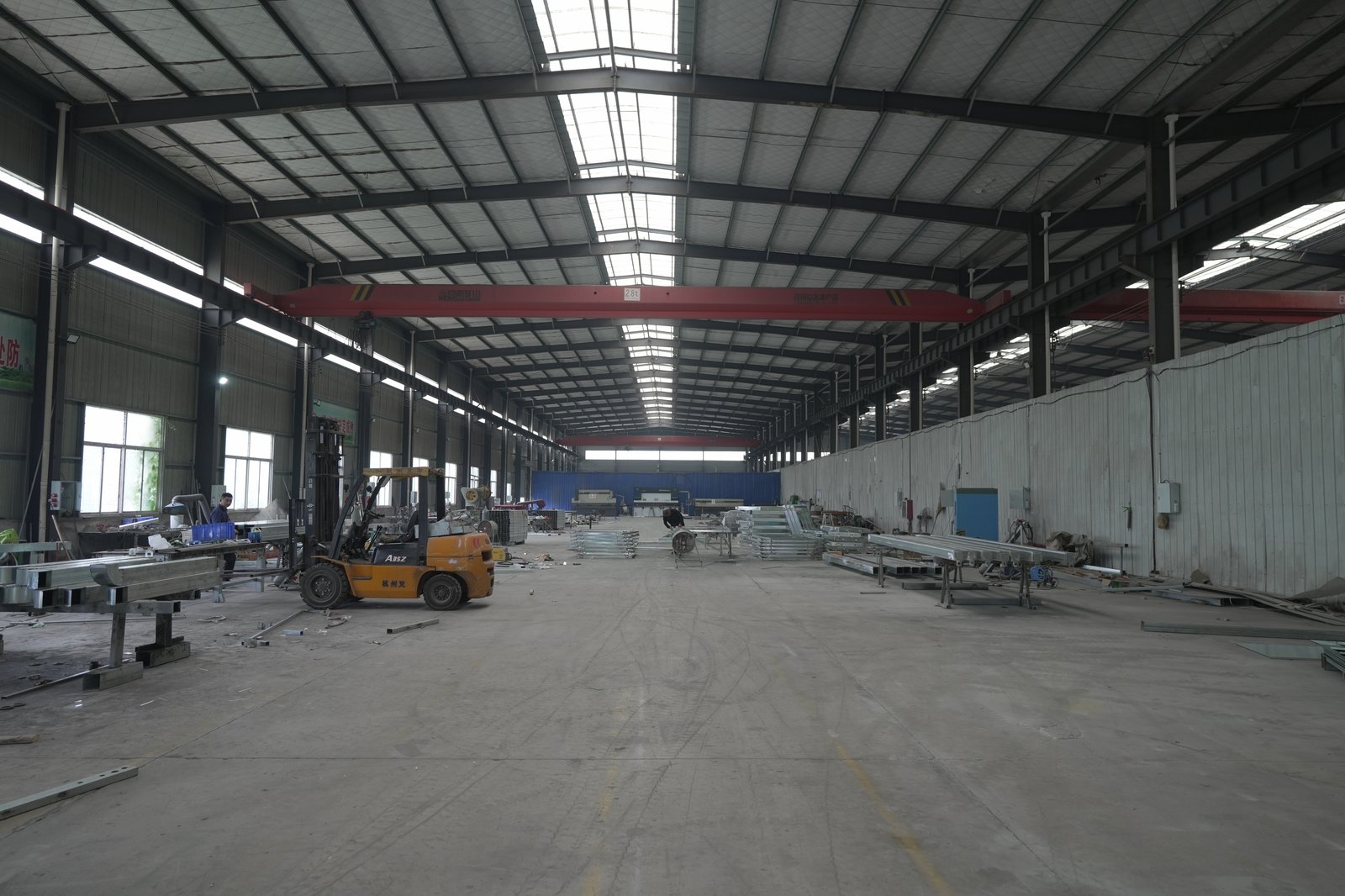 Factory workshop interior with overhead crane